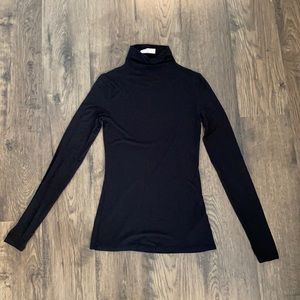 Babaton black turtleneck from Aritzia